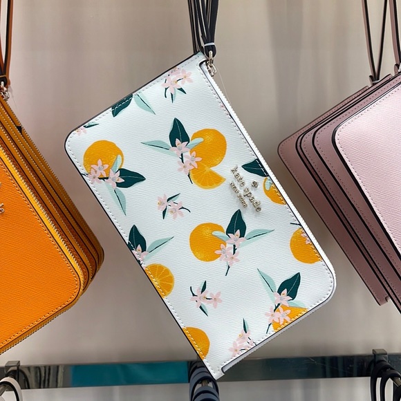 Kate Spade Lucy Orange Toss Printed Medium L-Zip Wristlet
Cream Multi
NWT - Picture 15 of 16